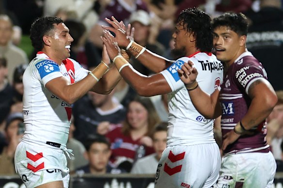 Tyrell Sloan (left) bagged a double for the Dragons.