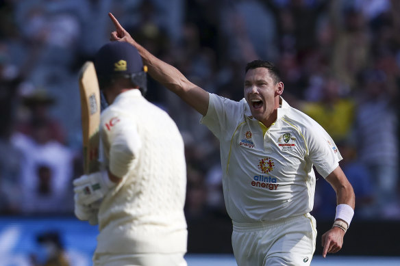 Scott Boland celebrates clean-bowling Jack Leach on the second day of the Boxing Day Test. 