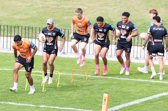 On the hop: Api Koroisau and Lachie Galvin at training on Thursday