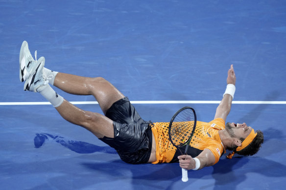  Jiri Vesely celebrates his surprise victory.