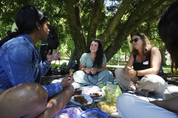 French backpackers Oceane Lemesle (centre) and Anais Tavernier (right) are travelling across Australia.