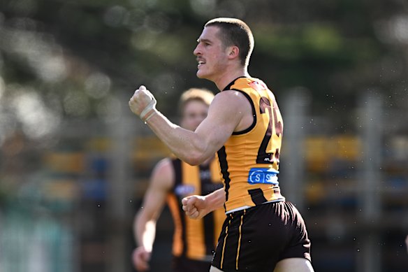 Josh Ward of the Hawks celebrates a goal.