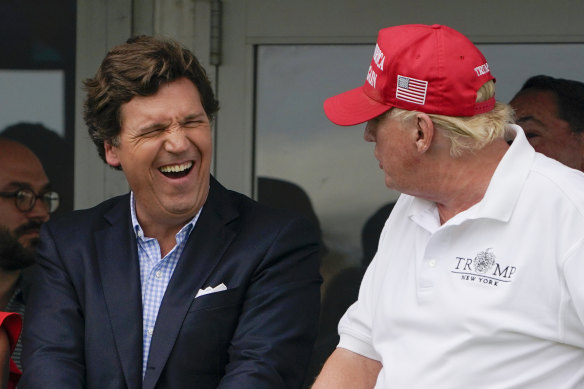 Tucker Carlson (left) and former US president Donald Trump, whom he hates, according to recently released documents.