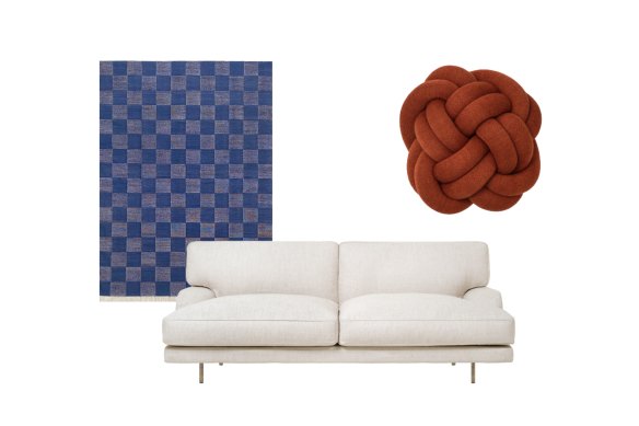 “Checkerboard Dhurrie” rug; “Flaneur” sofa; “Knot” cushion.