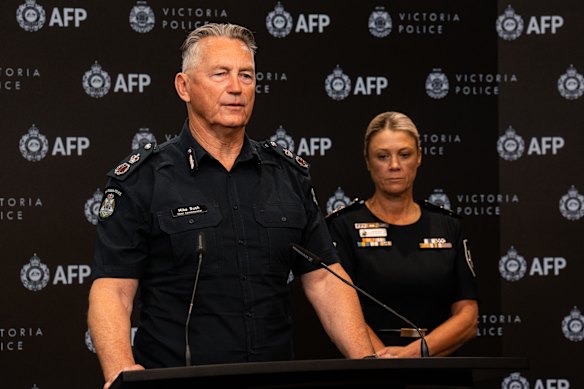 Victoria Police Chief Commissioner Mike Bush and AFP Commissioner Krissy Barrett address the media on Wednesday.