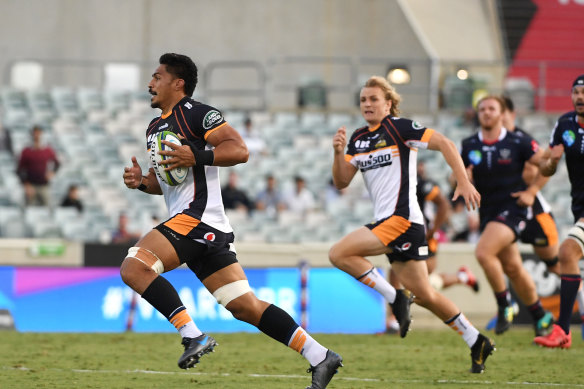 Pete Samu makes a break for the try line against the Rebels in Friday's game at GIO Stadium in Canberra.