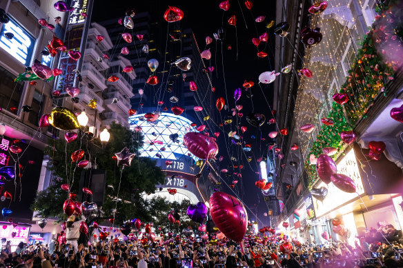 People release balloons into the air to celebrate the new year in Wuhan.
