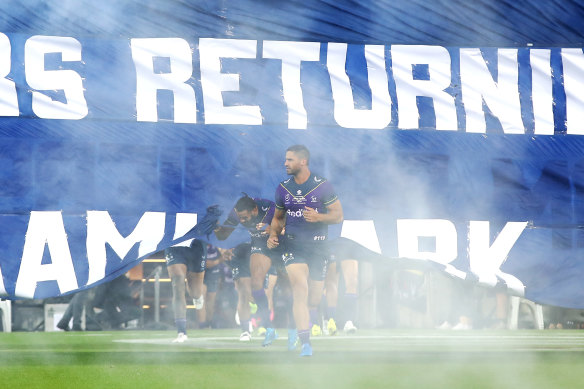 Jesse Bromwich leads the Storm onto the field in round one.