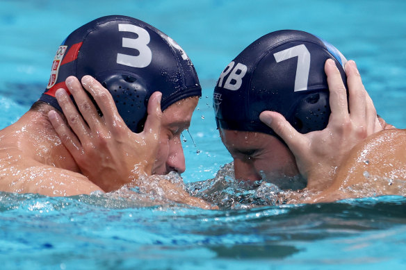 Nikola Dedovic and Strahinja Rasovic of Serbia celebrate gold.