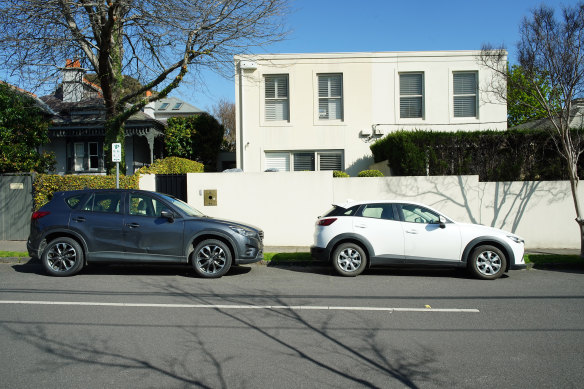 Cars parked along Ormsby Grove in Toorak.
