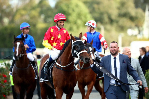 Happier times . . .   Joao Moriera returns to scale on Militarize after winning the Golden Rose. 