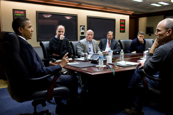 Jim Messina (fourth from left) with Barack Obama at The White House in 2011.