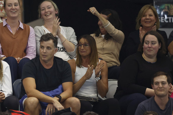 Hayley Lewis and husband Greg Taylor watch their son Kai in Melbourne.