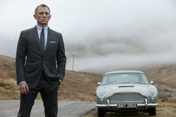 James Bond (Daniel Craig) and his trusty car (not a Toyota).