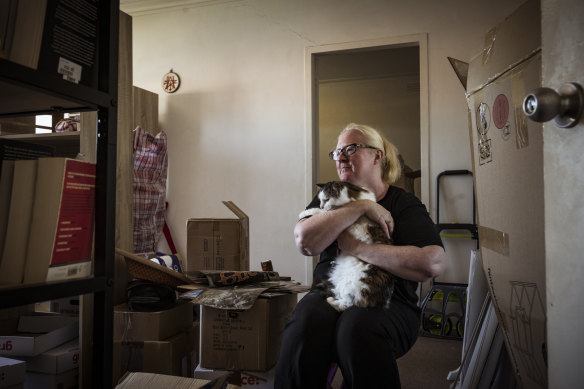 Megan Masters and cat Juno were happy to find a new home in better repair, but she says most homes that would be considered affordable were substandard. 