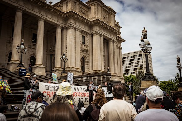 A rally against the demolition of public housing towers on the steps of Parliament House in 2025. 