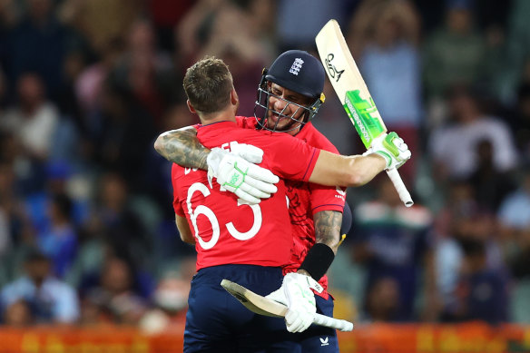 Jos Buttler and Alex Hales celebrate England’s victory.