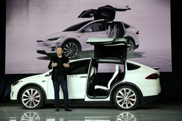 Musk, who has been a force for
electric vehicle adoption, at a Tesla
launch event.