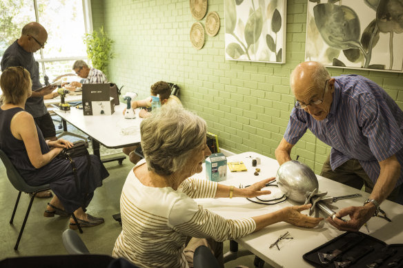 Carolyn de Castro Basto from Hampton gets her art deco lamp fixed by Robin Burrows.