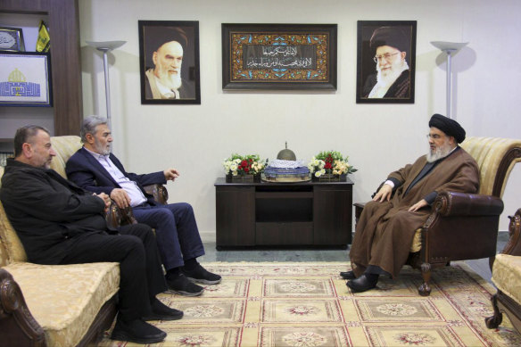 Hezbollah leader Sayyed Hassan Nasrallah, right, meets with Ziad al-Nakhleh, the head of Palestinian Islamic Jihad, centre, and Hamas deputy chief, Saleh al-Arouri, in Beirut, Lebanon. The photo is dated October 25.