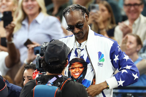 Snoop Dogg watches the women’s gymnastics qualification round.