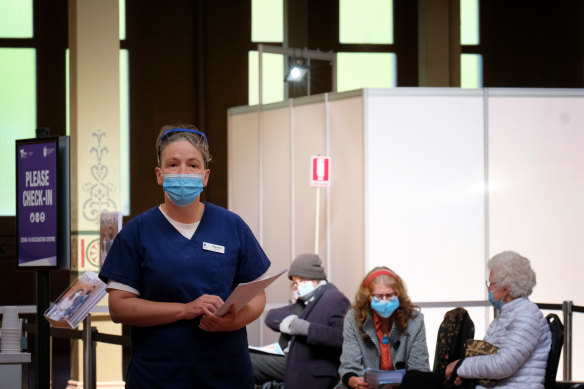 Nursing staff working at the mass vaccination hub at the Royal Exhibition Building on Wednesday.