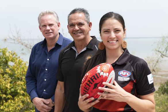 AFL NT chair Sean Bowden, Michael McLean, and Lateesha Jeffrey pose for a portrait at the foreshore in Darwin, Northern Territory.