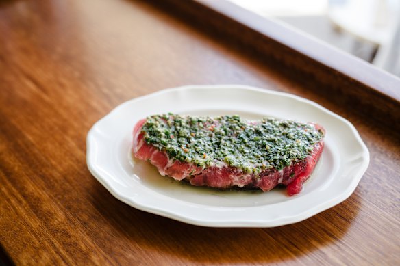 Yellowfin tuna with anchovy butter and salsa verde.
