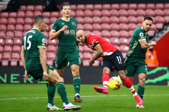 Nathan Redmond scores the last of Southampton's three goals against Sheffield United.