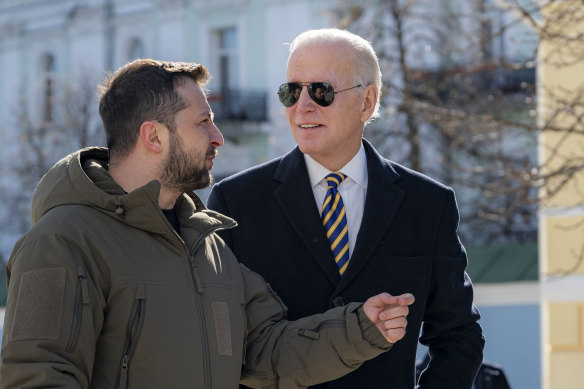 US President Joe Biden, right, and Ukrainian President Volodymyr Zelensky talk during an unannounced visit in Kyiv, Ukraine.