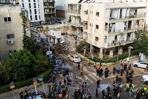 A crater left by an Iranian missile on Monday in Tel Aviv, Israel.