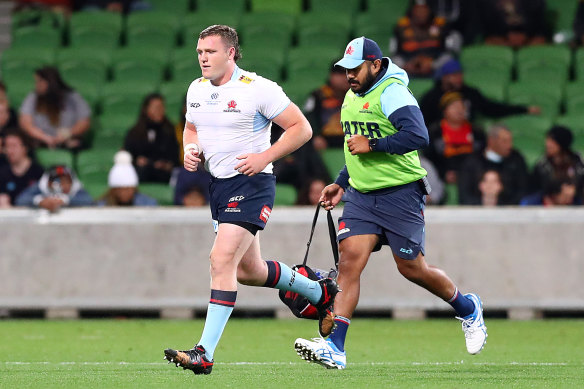 Angus Bell leaves the AAMI Park turf on Friday after being sent off.