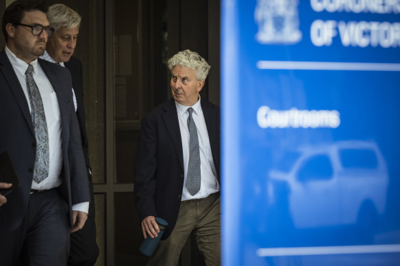 Air traffic controller John Tucker (right) outside the Coroners Court on Monday.