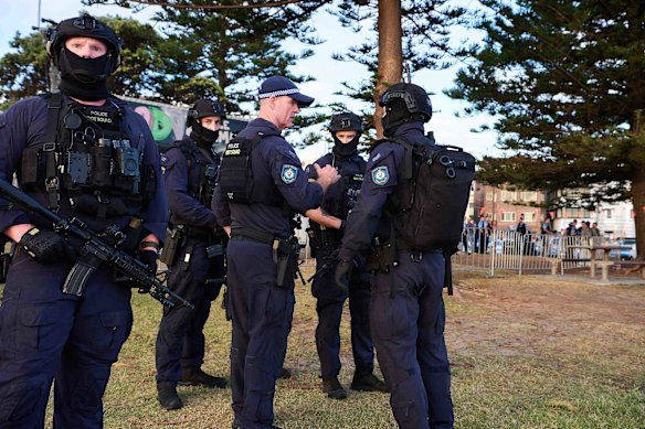 Police are deployed as events unfold after the shooting.