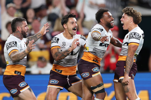 Ezra Mam celebrates a try for the Broncos in the grand final.