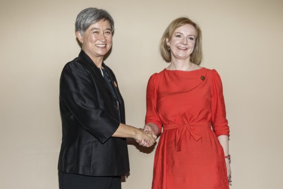 Foreign Minister Penny Wong with her UK counterpart and prime ministerial hopeful Liz Truss at the G20 in Indonesia.