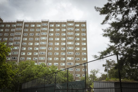 The public housing tower at 33 Alfred Street was locked down for two weeks in July 2020 when COVID-19 threatened to spread through the estate.
