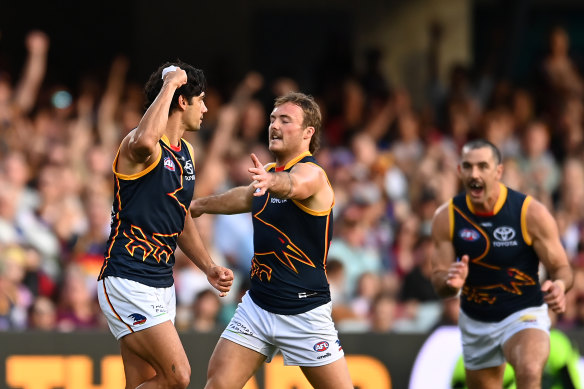 Shane McAdam celebrates a goal at the Crows.