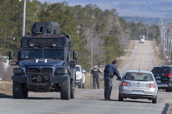 Police block the highway in Debert, Nova Scotia, during the mass shooting.