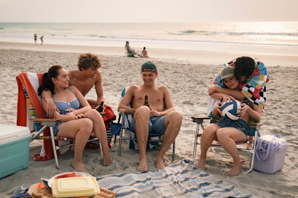 Belly (Lola Tung), Jeremiah (Gavin Casalegno), Conrad (Christopher Briney), Steven (Sean Kaufman), and Taylor (Rain Spencer) in season three of The Summer I Turned Pretty.