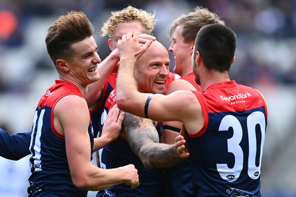 Nathan Jones and the Demons celebrate.