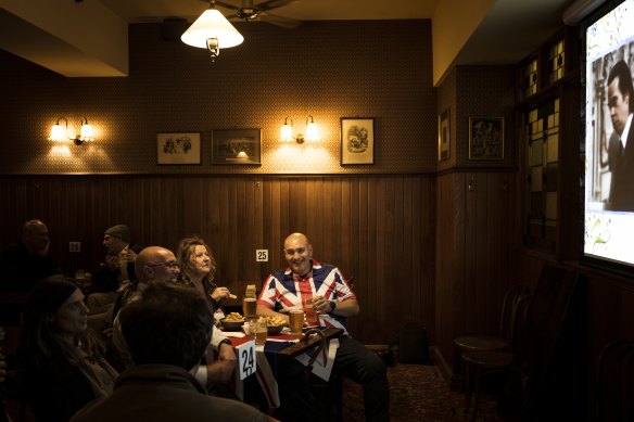 Kev Baker, Sallyanne Oakley and Paul Millwall settle in at the Charles Dickens Tavern to watch the coronation of King Charles.