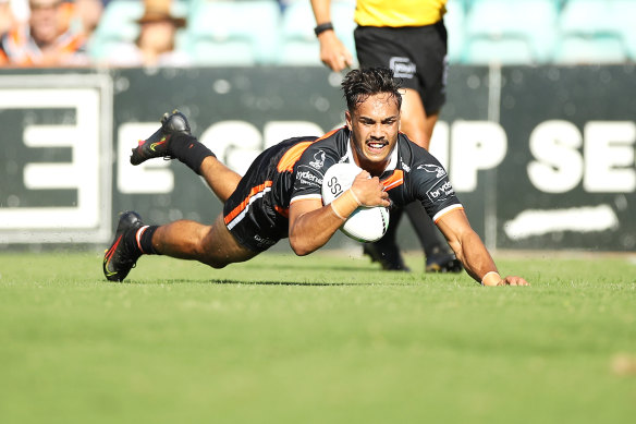 Daine Laurie’s stellar trial showing for Wests Tigers might complicate the selection picture for coach Michael Maguire.