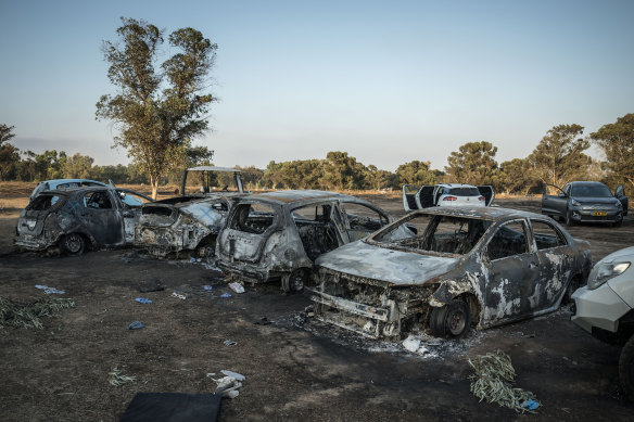 Burnt cars left behind after the massacre of hundreds of music festival goers by Hamas in Israel on October 7.