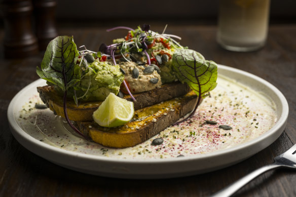 Smashed avocado and sweet potato hummus on toast.