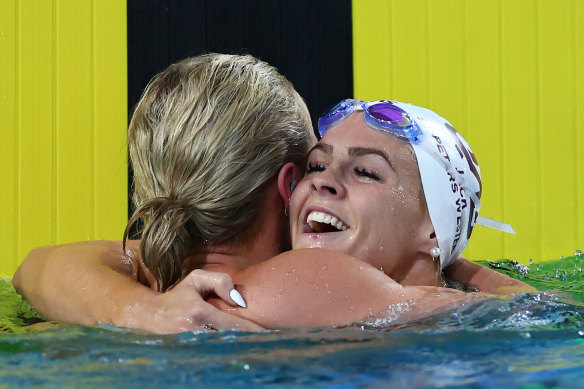 Shayna Jack, hugging Ariarne Titmus after the race, will finally go to an Olympics as part of the relay team.