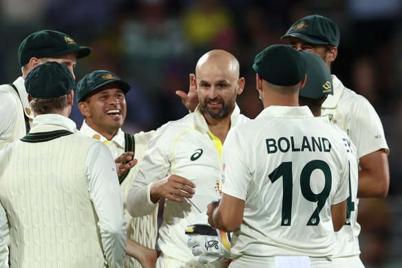 Nathan Lyon celebrates the wicket of Jermaine Blackwood against the West Indies in a day-night Test last year.