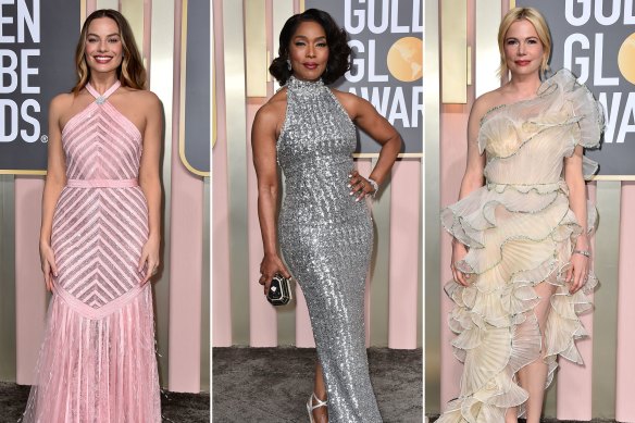 What recession?: Margot Robbie in Chanel, Angela Bassett in Pamella Roland and Michelle Williams in Gucci at the Golden Globes.