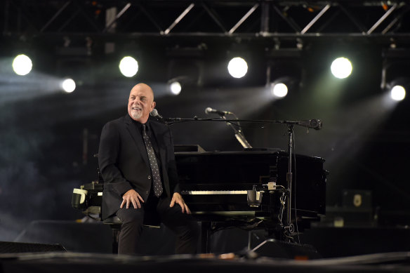 Billy Joel performs to a sold-out crowd at the MCG on Saturday.
