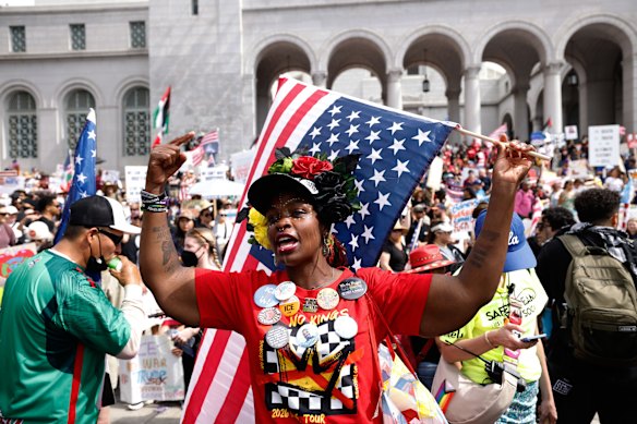 Demonstrators gather outside City Hall in Los Angeles.